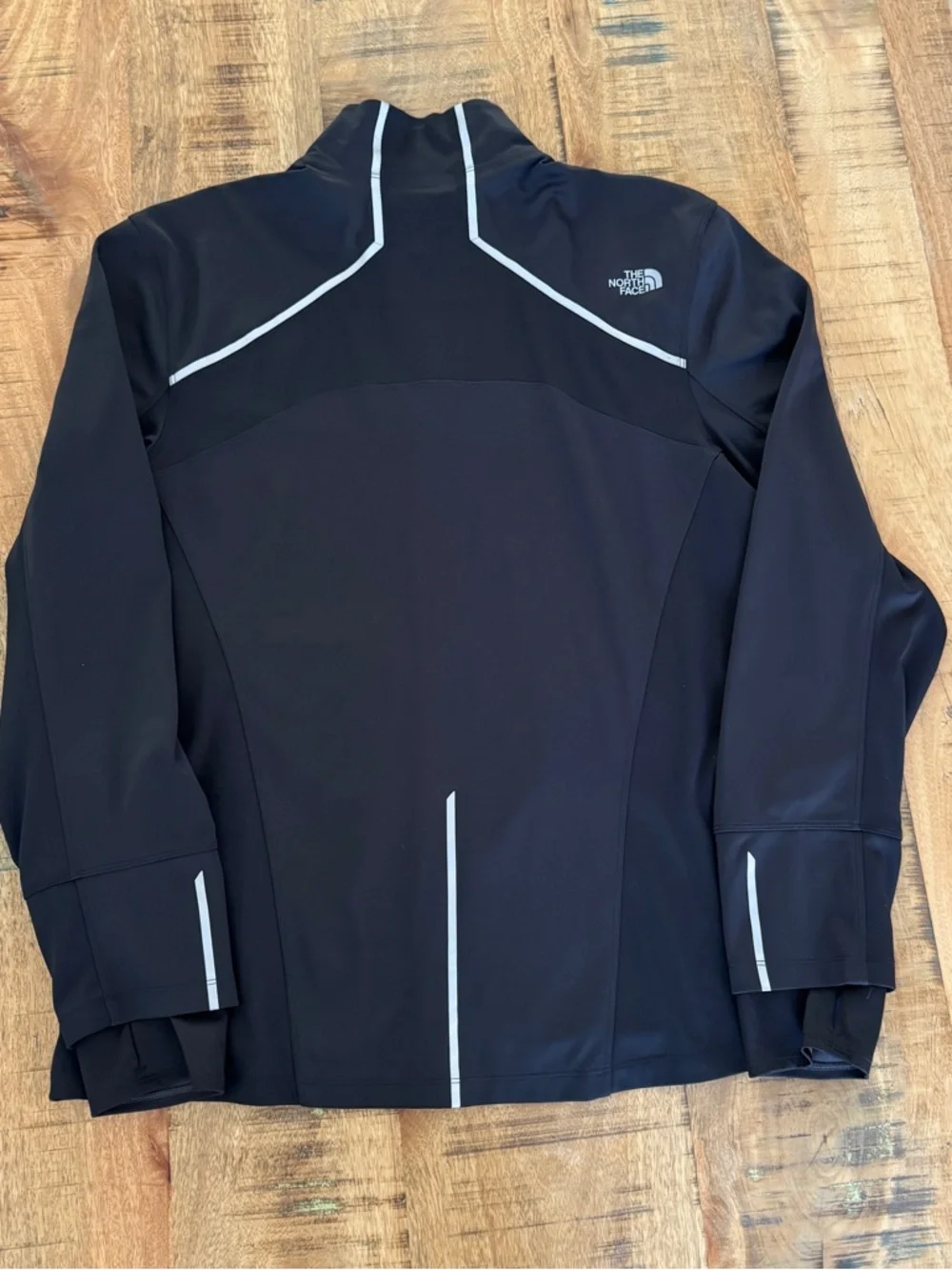 The North Face Men’s Black Lightweight Windstopper Jacket with Reflective Trim